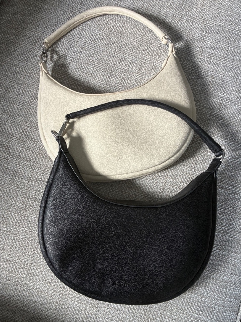 Bundle of TWO BCBG Cream and Black Crescent Leather Minimalist Shoulder Bags